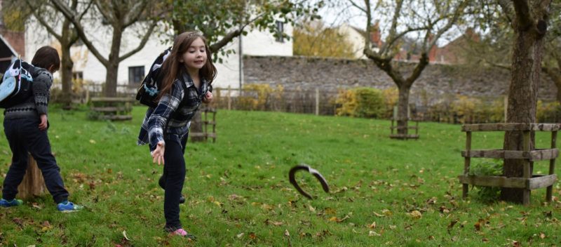 Child_Throwing_Horseshoe