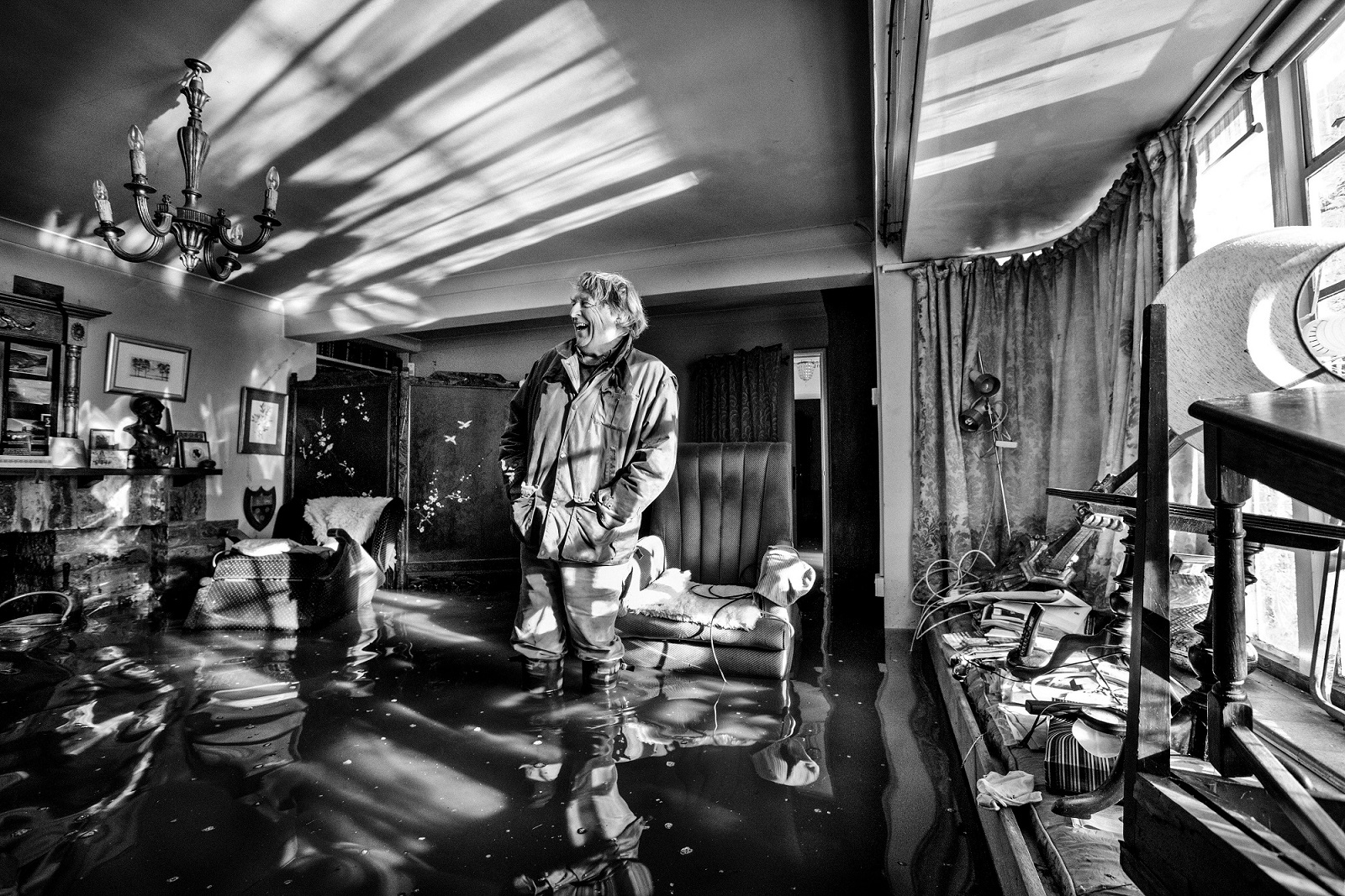 Matilda's father in her grandfather's flooded house