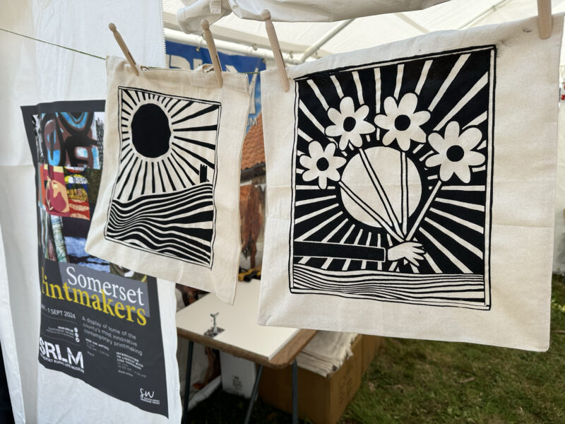 Artworks hanging from marquee.