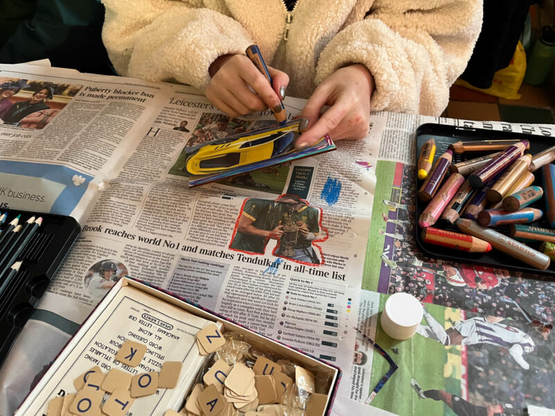 Participant colouring in their craft.