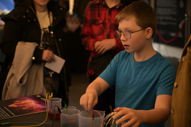 Participant taking part in the 'experiment' installation.