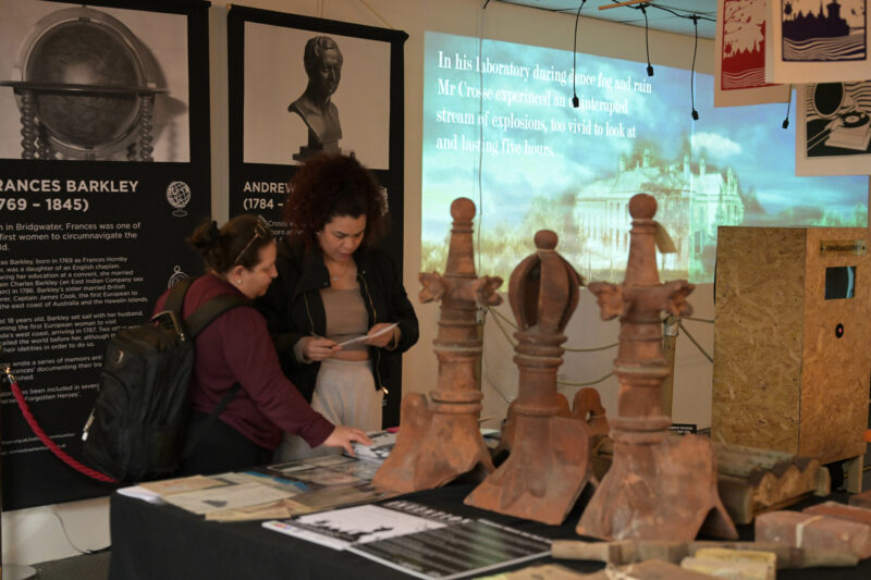 Visitors exploring the museum objects and information.